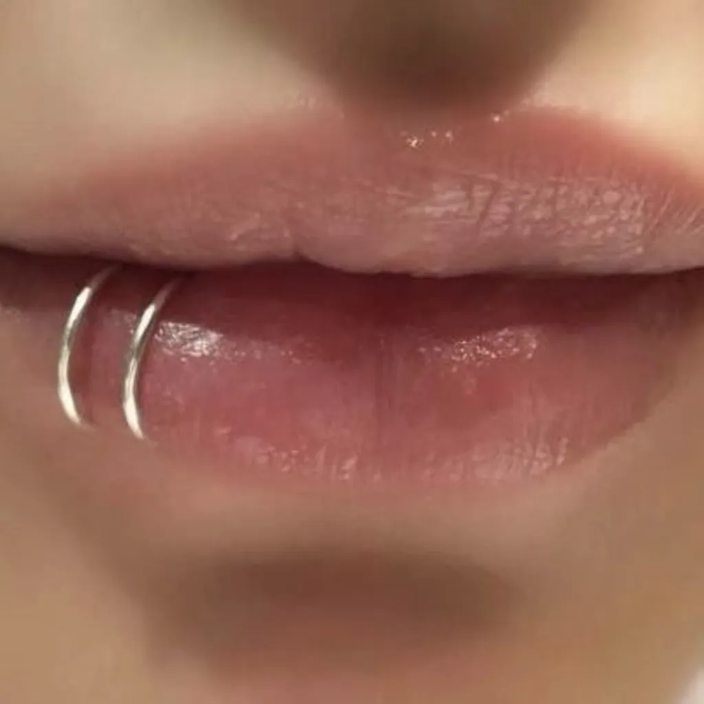 Lip Piercing at Tattoo Nine, Chirag Ali Lane, Abids, Hyderabad, Telangana 500001.
