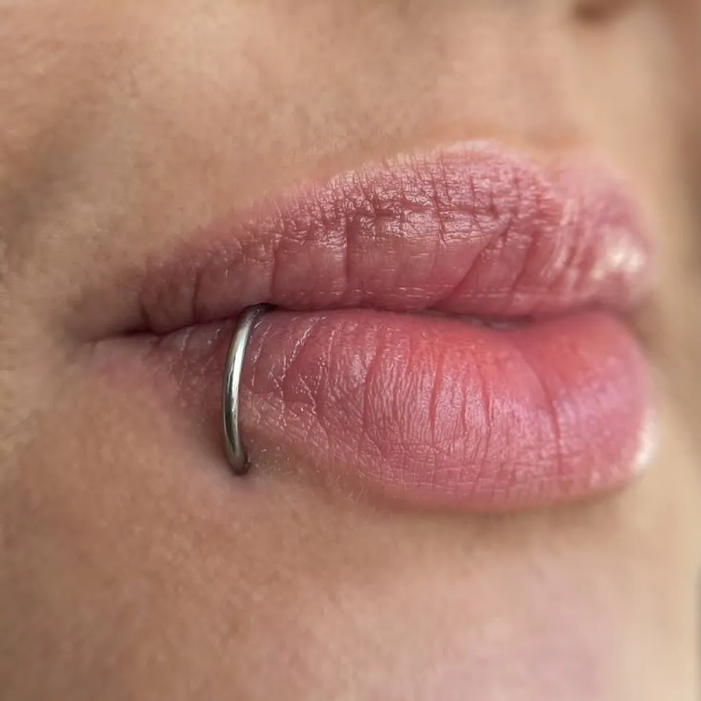 Lip Piercing at Tattoo Nine, Chirag Ali Lane, Abids, Hyderabad, Telangana 500001.
